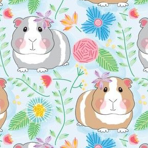 large guinea pigs and embroidered flowers on soft blue