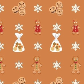 christmas baking gingerbread men and women on brown