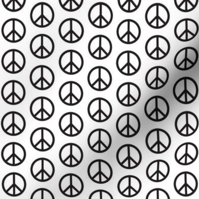 tiny black peace signs on white