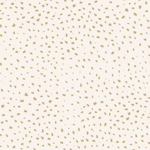 Little cheetah baby animal print minimal small speckles and spots abstract wild cat fur mustard yellow ochre on ivory
