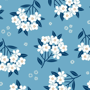 Spring morning blossom. Light blue background. Wallpaper scale