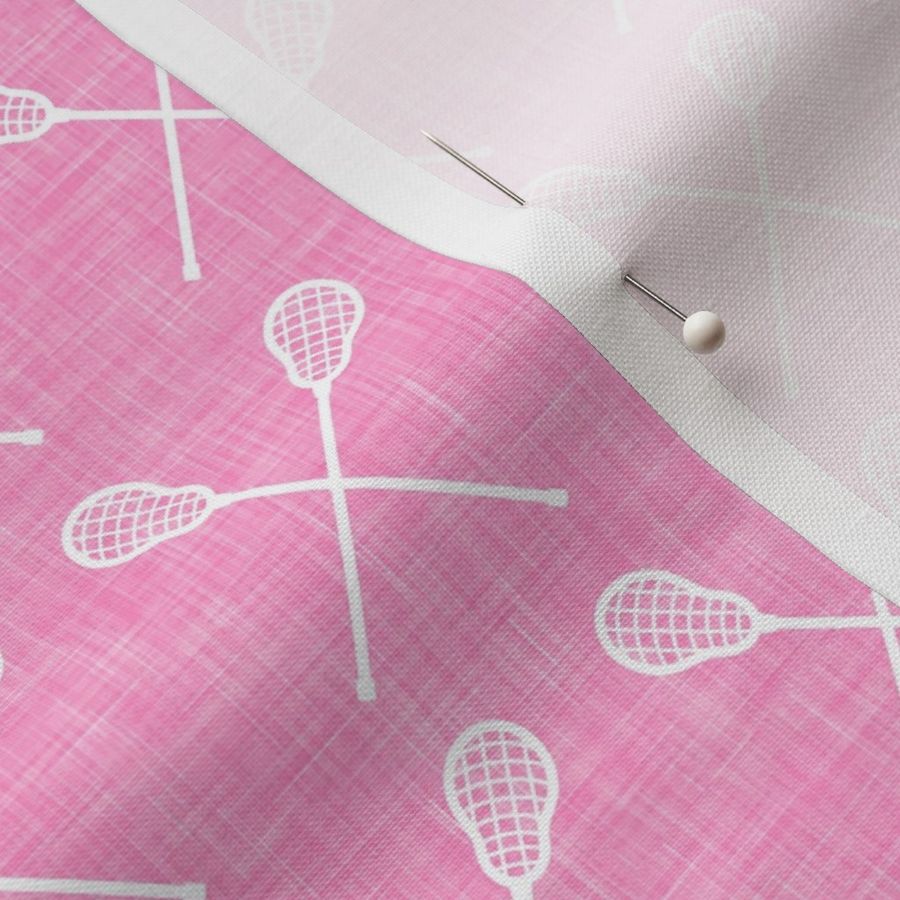 lacrosse crossed sticks - pink - C21