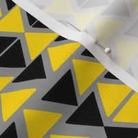 black and yellow triangles on grey