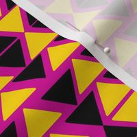 black and yellow triangles on pink