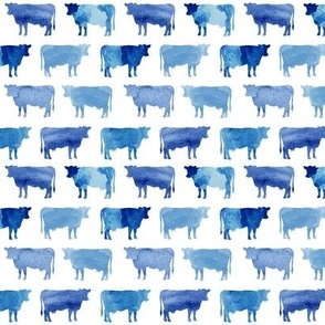 small blue watercolor cows