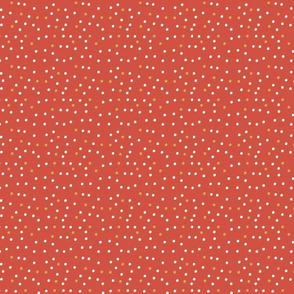Confetti dots on red.