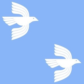White birds on blue background