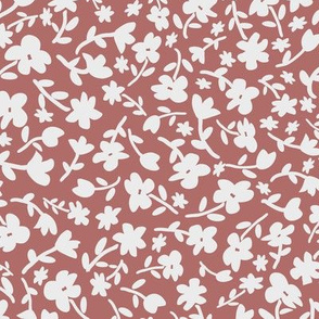 Ditsy flowers on pale burgundy