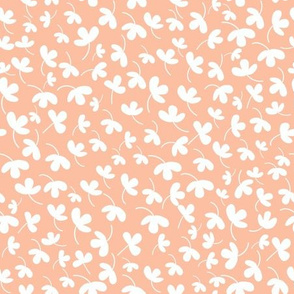 Ditsy flowers on peachy pink