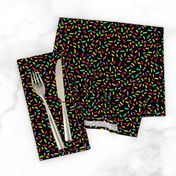 Smaller Scale Candy Rainbow Confetti Sprinkles on Black