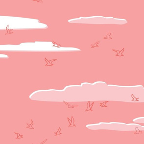 Seagulls Soaring Through the Clouds at Sunset - Monochromatic Coral Pink