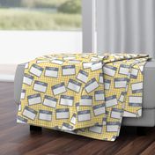 Scattered Thai 'hello my name is' nametags - grey on yellow gingham