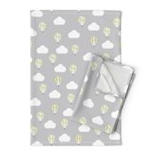 Grey Fabric with a Lemon Hot Air Balloon Design with White Clouds