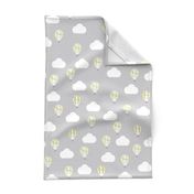 Grey Fabric with a Lemon Hot Air Balloon Design with White Clouds