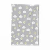 Grey Fabric with a Lemon Hot Air Balloon Design with White Clouds