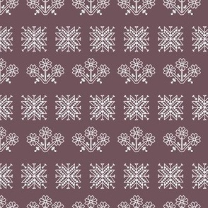 ethnic flowers Ornament of folk embroidery, white contour on mauve, plum background. 
