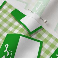 Scattered Arabic 'hello my name is' nametags - green on gingham