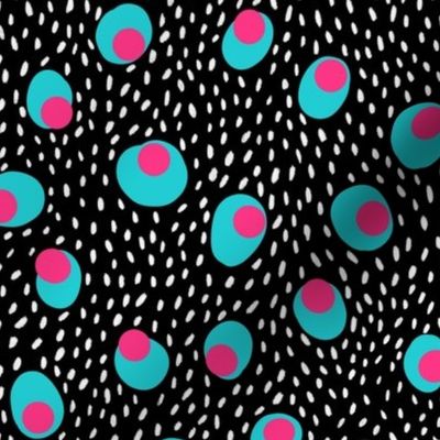 Spots and dashes in black, blue and magenta