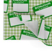 Scattered French 'hello my name is' nametags - green on gingham