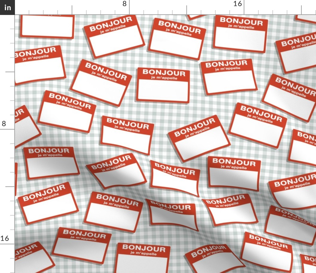 Scattered French 'hello my name is' nametags - red on grey gingham