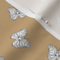 The minimalist boho butterfly nursery scandi textiles camel beige white