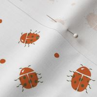 Lady bug polka dot two in dark rich terracotta orange