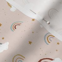 Rainbows clouds and golden stars and raindrops sweet boho style nursery baby design neutral blush beige blue orange 