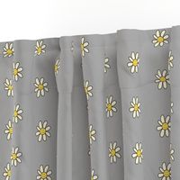 grumpy daisy flower on grey