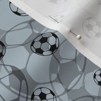 Football / Soccer balls on grey 