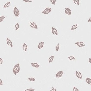 Blush pink hand-stamped tiny leaves tossed on white smoke background
