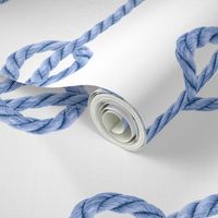 Pastel blue nautical rope rows selfknots white background