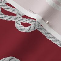 Vertical rope knots white dark red