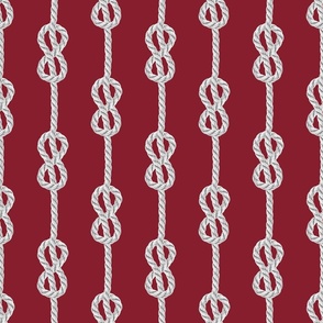 Vertical rope knots white dark red