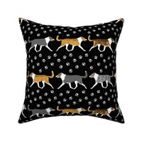 Trotting smooth coated Collies paw print border
