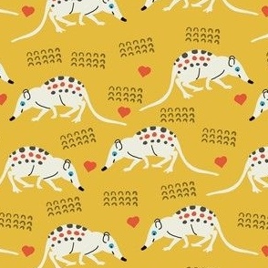 Rico the elephant shrew on mustard yellow with red hearts