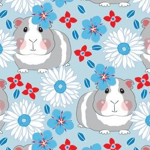 large guinea pigs with red white and blue flowers
