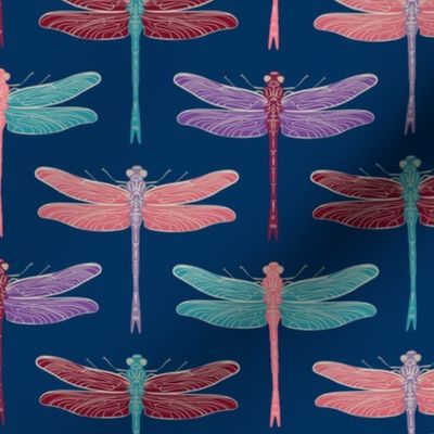 Vibrant colorful dragonflies on blue - medium