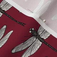 Decorated dragonflies- black line art on dark red