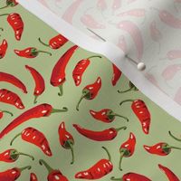 Chili peppers on light green