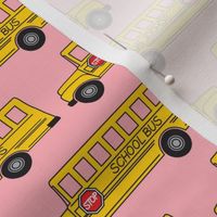 school buses on pink