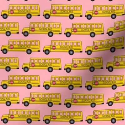tiny school bus on pink