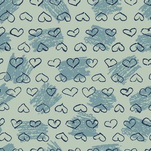 Blue hearts on green background