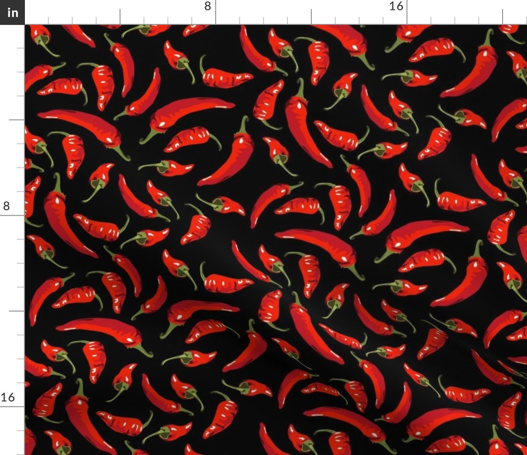Chili peppers on black - large scale