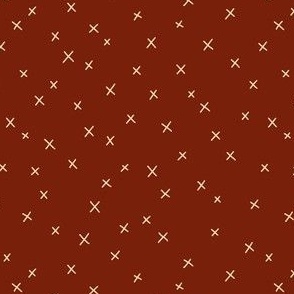 Delicate cross pattern on brown