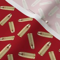 Brass 9mm Hunting Ammo On Red