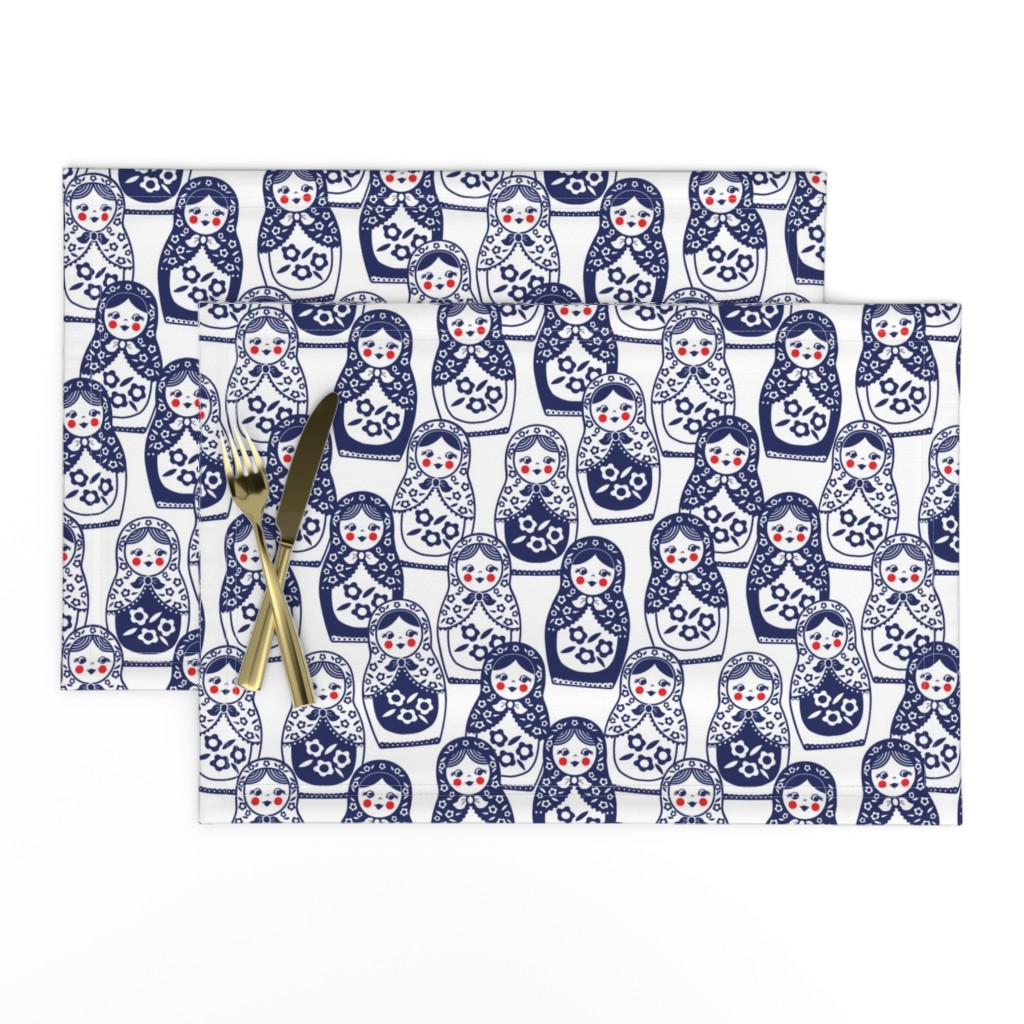 matryoshka doll in navy, red, and white