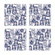 matryoshka doll in navy, red, and white