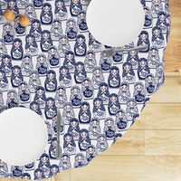 matryoshka doll in navy, red, and white