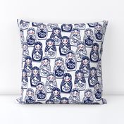 matryoshka doll in navy, red, and white