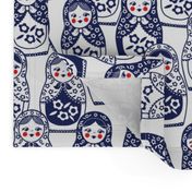 matryoshka doll in navy, red, and white